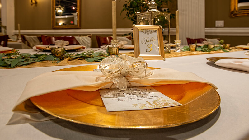 Table setting with gold plate